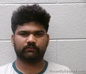 Mugshot of AJIT SINGH booked in Henderson County, North Carolina on July 10, 2026