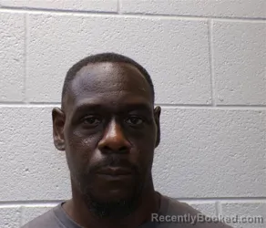 Mugshot of JOHN GARLAND REID booked in Henderson County, North Carolina on July 15, 2026