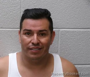 Mugshot of JOSE ADAN GARCIA-CORDOVA booked in Henderson County, North Carolina on July 17, 2026