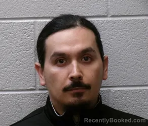 Mugshot of Eddie Cruz Mendez booked in Henderson County, North Carolina on August 19, 2026