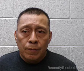Mugshot of Inocenio Dela Cruz Garcia booked in Henderson County, North Carolina on August 24, 2026