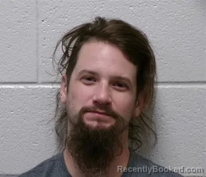 Mugshot of Jefferey James Schneeberger booked in Henderson County, North Carolina on August 27, 2026