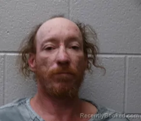 Mugshot of Mark Anthony Cobb booked in Henderson County, North Carolina on August 27, 2026