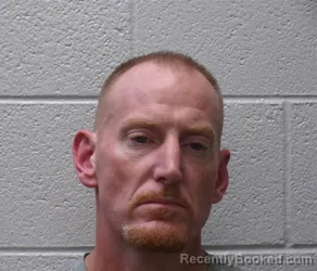 Mugshot of Ryan A Adcock booked in Henderson County, North Carolina on September 1, 2026