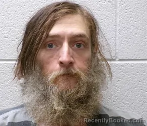 Mugshot of Michael Eric Dover booked in Henderson County, North Carolina on September 5, 2026