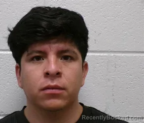 Mugshot of Angel Eduardo Hernandez booked in Henderson County, North Carolina on September 12, 2026