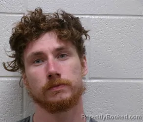 Mugshot of Austin Tyler Corey booked in Henderson County, North Carolina on September 15, 2026