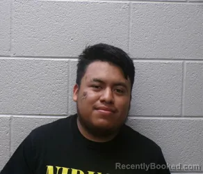Mugshot of Edilcer Elilco Garcia Aquilar booked in Henderson County, North Carolina on October 4, 2026