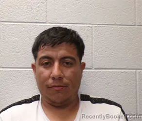 Mugshot of Luis Artuo Cortes-Mejia booked in Henderson County, North Carolina on October 26, 2026