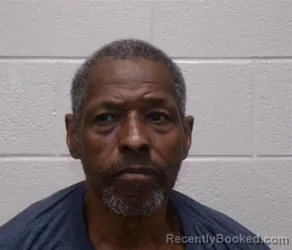 Mugshot of Charleston Raynard Haynes booked in Henderson County, North Carolina on August 6, 2026