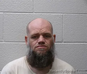 Mugshot of MICHAEL WAYNE PULLEY booked in Henderson County, North Carolina on May 3, 2026