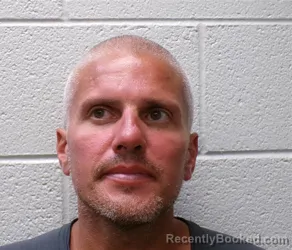 Mugshot of Joshua James Quisenberry booked in Henderson County, North Carolina on September 10, 2026
