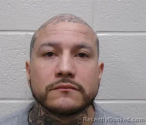 Mugshot of SAUL ALBERT HINSON booked in Henderson County, North Carolina on May 20, 2026