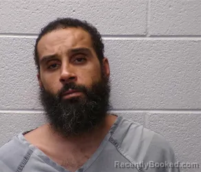 Mugshot of JUSTIN ROBERT LAMPER booked in Henderson County, North Carolina on May 9, 2026