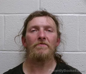 Mugshot of JASON LEE MOORE booked in Henderson County, North Carolina on May 8, 2026