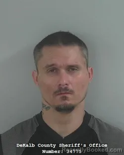 Mugshot of Adam Ray Coburn booked in DeKalb County, Indiana on May 12, 2026