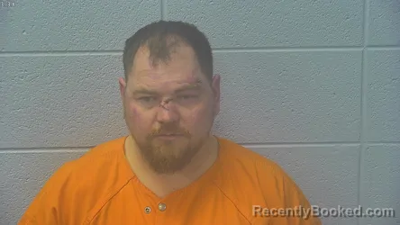 Mugshot of JUSTIN ALLEN GRAYSON