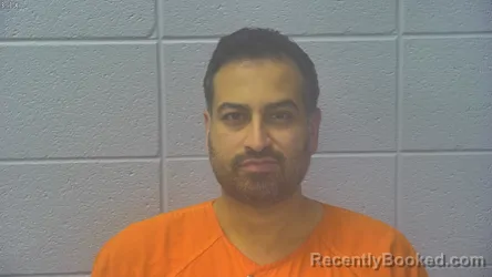 Mugshot of Najib Abbas Mukadam booked in Dubois County, Indiana on August 13, 2026