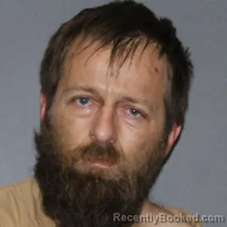 Mugshot of Catlin Jay Schmucker booked in Elkhart County, Indiana on March 17, 2026