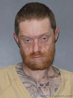 Mugshot of John Wayne Henderson booked in Elkhart County, Indiana on March 31, 2026