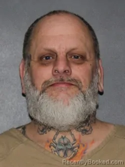 Mugshot of Al Kinsey