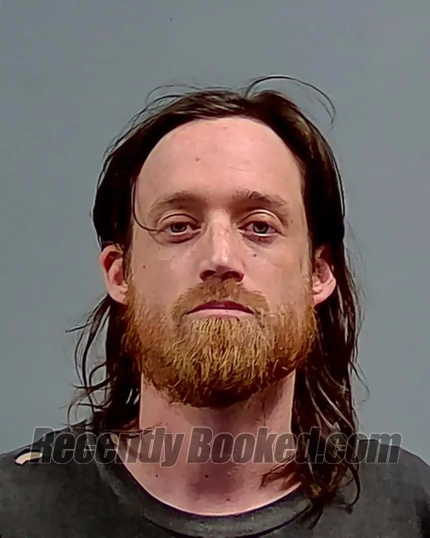 Booking photo from Escambia County, Florida