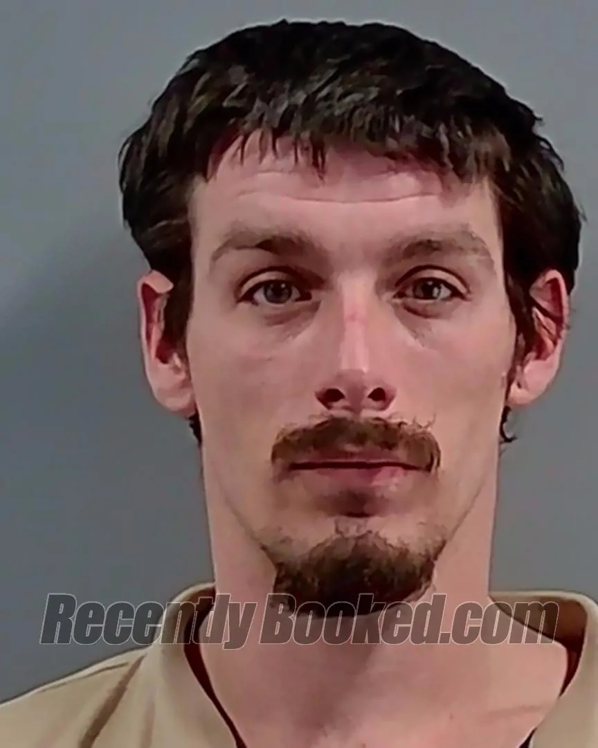 Booking photo from Escambia County, Florida