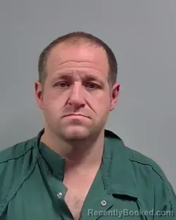 Mugshot of JUSTIN WILLIAM RUGG