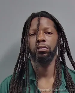 Mugshot of JUSTIN MARCEL GEORGE