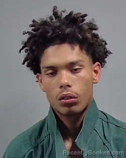 Mugshot of ESCABAR EMANUEL SIDENER