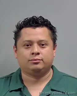 Mugshot of NILSSEN RODIMIRO FONT GOMEZ booked in Escambia County, Florida on March 7, 2026