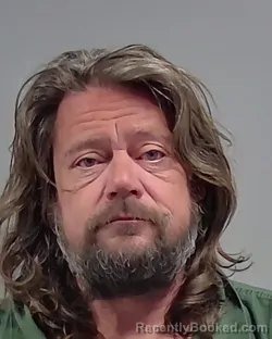 Mugshot of DONALD JASON BIRKS booked in Escambia County, Florida on March 8, 2026