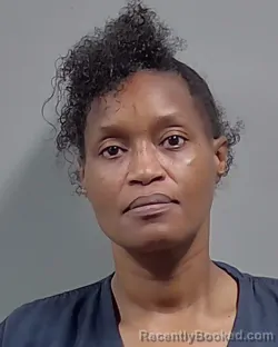 Mugshot of RONDA LASHAY HILL booked in Escambia County, Florida on March 8, 2026