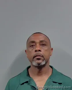 Mugshot of OLLIE LEON MOORER booked in Escambia County, Florida on March 10, 2026