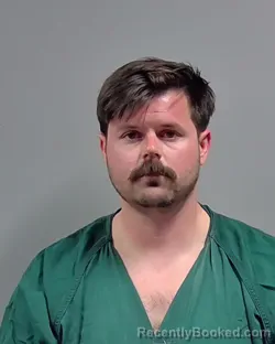 Mugshot of CHARLES ZACKERY KIRK booked in Escambia County, Florida on March 11, 2026