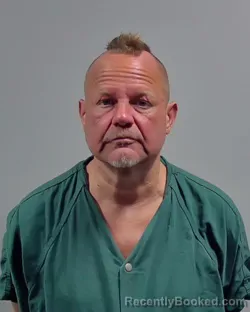 Mugshot of JOHN DAVID LEWIS booked in Escambia County, Florida on March 11, 2026