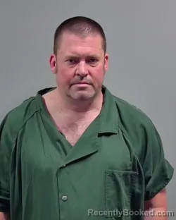 Mugshot of JOHN MICHAEL ESTES booked in Escambia County, Florida on March 11, 2026