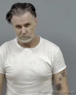 Mugshot of ROBERT ERIC CARLSON booked in Escambia County, Florida on March 12, 2026