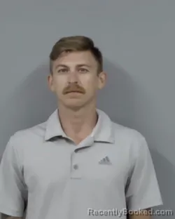 Mugshot of KEENEN DICKSON booked in Escambia County, Florida on March 12, 2026