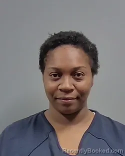 Mugshot of ASHLEY NICOLE EATON booked in Escambia County, Florida on March 12, 2026