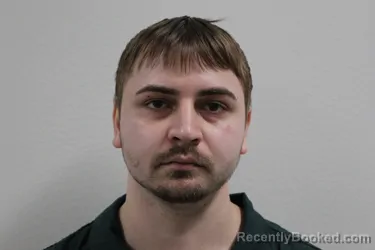 Mugshot of MICHAEL STANISLAW BACHLEDA booked in Escambia County, Florida on March 12, 2026