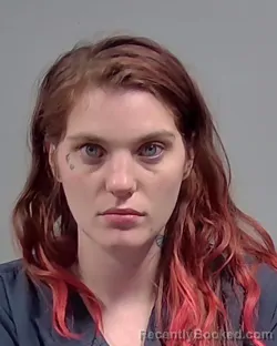 Mugshot of LILIAN MARIE MCDANIEL booked in Escambia County, Florida on March 12, 2026