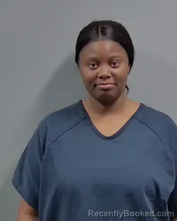 Mugshot of MARCIA MERCEDES MITCHELL booked in Escambia County, Florida on March 12, 2026