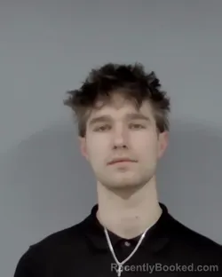 Mugshot of ANGELO EMIL KOZELUH booked in Escambia County, Florida on March 13, 2026