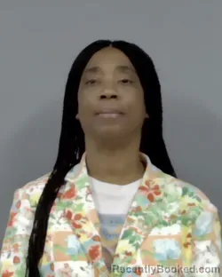 Mugshot of KIMBERLY MARIE GARNER booked in Escambia County, Florida on March 13, 2026