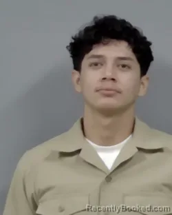 Mugshot of ISSAC MIGUEL FELICIANO booked in Escambia County, Florida on March 13, 2026