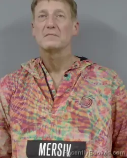 Mugshot of PAUL MICHAEL RASLEVICH booked in Escambia County, Florida on March 13, 2026