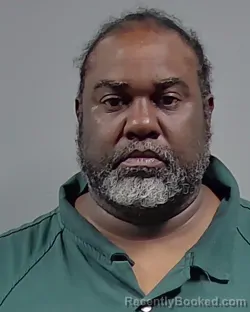 Mugshot of CLEO ROOSEVELT BRUSTER booked in Escambia County, Florida on March 13, 2026