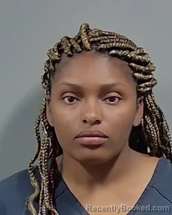 Mugshot of NY'QAESHIA RENEA THOMAS booked in Escambia County, Florida on March 13, 2026