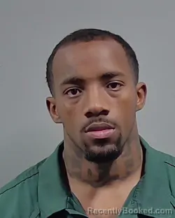 Mugshot of LATEVIN PARRISH JOHNSON booked in Escambia County, Florida on March 13, 2026